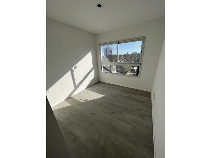 Departamento  2 dormitorios en arroyito, amenities y cochera.